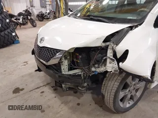 2014 Toyota Sienna SE with VIN 5TDXK3DC7ES497390, listed as a IAAI auction lot 42037096 with 169,127 mi miles and . Bid and sale history available at DreamBid. Image 6.