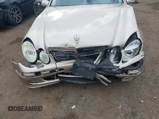 2005 Mercedes-Benz E-Class 3.2L with VIN WDBUF65J25A614469, listed as a IAAI auction lot 41521864 with 90,403 mi miles. Bid and sale history available at carsss.com. Image 6.