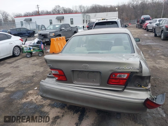 1998 Toyota Avalon XL with VIN 4T1BF18B7WU256930, listed as a IAAI auction lot 41297552 with 210,745 mi miles and . Bid and sale history available at DreamBid. Image 17.