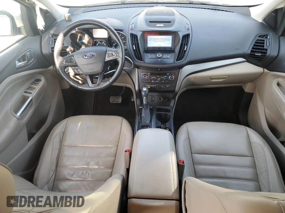 2017 Ford Escape SE with VIN 1FMCU0GD6HUB48986, listed as a Copart auction lot 43915415 with 122,465 mi miles and Salvage Title. Bid and sale history available at DreamBid. Image 8.