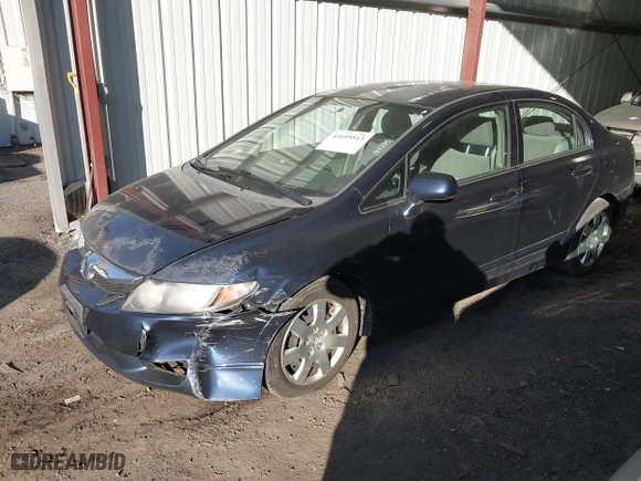2009 Honda Civic Sdn LX with VIN 2HGFA16559H544472, listed as a IAAI auction lot 41695513 with 124,845 mi miles. Bid and sale history available at carsss.com. Image 17.