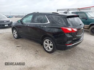2018 Chevrolet Equinox Premier with VIN 2GNAXVEV7J6275379, listed as a IAAI auction lot 41949962 with 149,329 mi miles and . Bid and sale history available at DreamBid. Image 3.
