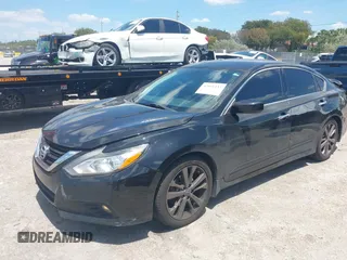 2018 Nissan Altima SV with VIN 1N4AL3AP8JC259494, listed as a IAAI auction lot 42041433 with 150,970 mi miles and . Bid and sale history available at DreamBid. Image 18.