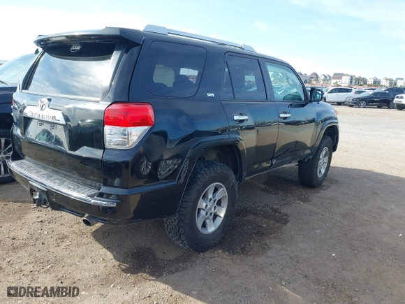 2010 Toyota 4Runner SR5 with VIN JTEZU5JR5A5010223, listed as a IAAI auction lot 41758066 with 221,166 mi miles. Bid and sale history available at carsss.com. Image 4.