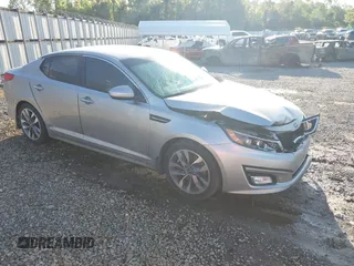 2015 Kia Optima SX z VIN 5XXGR4A72FG419739, wystawiony jako IAAI lot #41972453 z przebiegiem 204 336 mil mil oraz . Historia ofert i sprzedaży dostępna na DreamBid. Obrazek 1.