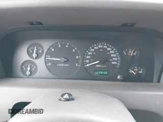 1999 Jeep Grand Cherokee Limited with VIN 1J4GW68N7XC739479, listed as a IAAI auction lot 41448323 with 129,840 mi miles. Bid and sale history available at carsss.com. Image 7.