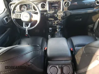 2021 Jeep Wrangler Unlimited Sahara High Altitude with VIN 1C4HJXEG0MW671105, listed as a Copart auction lot 74175244 with 51,610 mi miles and Salvage title. Bid and sale history available at DreamBid. Image 8.