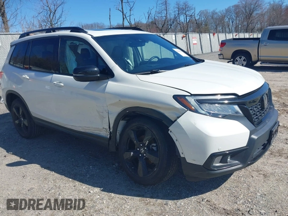2019 Honda Passport Elite z VIN 5FNYF8H04KB005307, wystawiony jako IAAI lot #41828725 z przebiegiem 61 864 mil mil oraz . Historia ofert i sprzedaży dostępna na DreamBid. Obrazek 1.
