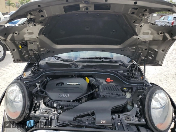 2018 MINI Hardtop Cooper with VIN WMWXP5C56J2H29012, listed as a Copart auction lot 50571595 with 77,129 mi miles and Salvage title. Bid and sale history available at DreamBid. Image 11.