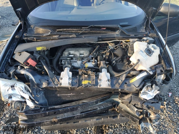 1999 Chevrolet Venture with VIN 1GNDX03E6XD330398, listed as a Copart auction lot 77621004 with 80,625 mi miles and Salvage Title. Bid and sale history available at carsss.com. Image 13.