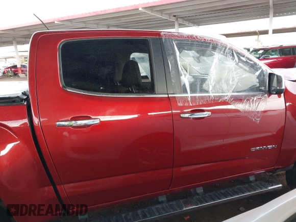 2015 GMC Canyon 2WD SLT with VIN 1GTG5CE39F1225427, listed as a IAAI auction lot 41453753 with 115,801 mi miles. Bid and sale history available at carsss.com. Image 12.