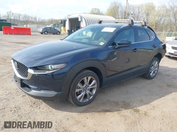 2021 Mazda CX-30 Premium with VIN 3MVDMBDM4MM238367, listed as a IAAI auction lot 42124335 with 31,120 mi miles and . Bid and sale history available at DreamBid. Image 2.