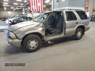 2001 GMC Jimmy SLE z VIN 1GKDT13W012139845, wystawiony jako Copart lot #56231995 z przebiegiem 214 566 mil mil oraz Szkody całkowita. Historia ofert i sprzedaży dostępna na DreamBid. Obrazek 1.