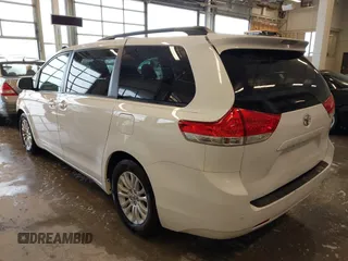 2014 Toyota Sienna XLE with VIN 5TDYK3DC5ES508021, listed as a IAAI auction lot 41963128 with 162,578 mi miles. Bid and sale history available at carsss.com. Image 3.