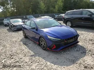 2022 Hyundai Elantra N with VIN KMHLW4AK1NU002953, listed as a Copart auction lot 71933364 with 27,515 mi miles and Salvage Title. Bid and sale history available at carsss.com. Image 11.