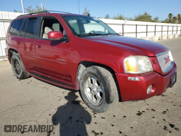 2006 GMC Envoy Denali with VIN 1GKES63M762237958, listed as a Copart auction lot 76999574 with 180,294 mi miles and Clean Title. Bid and sale history available at carsss.com. Image 4.