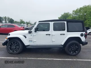 2022 Jeep Wrangler Unlimited Sahara with VIN 1C4JJXP69NW229124, listed as a IAAI auction lot 42525560 with 45,857 mi miles and . Bid and sale history available at DreamBid. Image 14.