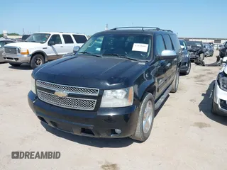 2011 Chevrolet Suburban LT with VIN 1GNSCJE09BR235355, listed as a IAAI auction lot 42030105 with 308,576 mi miles. Bid and sale history available at carsss.com. Image 17.