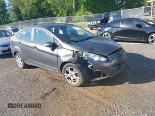 2016 Ford Fiesta SE z VIN 3FADP4BJ8GM184675, wystawiony jako IAAI lot #42169234 z przebiegiem 54 231 mil mil oraz . Historia ofert i sprzedaży dostępna na DreamBid. Obrazek 1.
