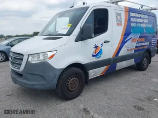 2019 Mercedes-Benz Sprinter Cargo Van with VIN WD4PF0CD8KT001089, listed as a IAAI auction lot 41795578 with 132,071 mi miles. Bid and sale history available at carsss.com. Image 2.