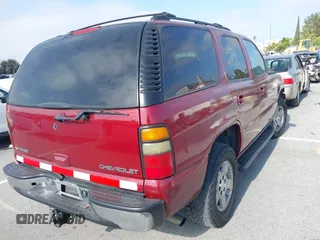 2004 Chevrolet Tahoe LS with VIN 1GNEC13T64J226513, listed as a IAAI auction lot 39773781 with 250,788 mi miles. Bid and sale history available at carsss.com. Image 4.