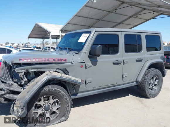 2019 Jeep Wrangler Unlimited Rubicon with VIN 1C4HJXFN6KW547401, listed as a IAAI auction lot 42250698 with 103,910 mi miles and . Bid and sale history available at DreamBid. Image 14.