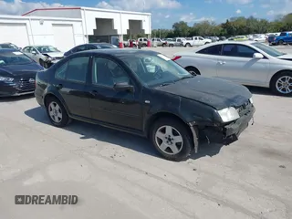 2002 Volkswagen Jetta GLS z VIN 3VWSB69M32M182981, wystawiony jako IAAI lot #41543378 z przebiegiem 256 597 mil mil oraz . Historia ofert i sprzedaży dostępna na DreamBid. Obrazek 1.