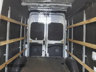 2021 Ford Transit Cargo с VIN 1FTBR1X80MKA26754, выставлен на аукционе Copart как лот 57982185 с пробегом 80 537 миль миль и Списание • Salvage title. История ставок и продаж доступна на DreamBid. Изображение 10.