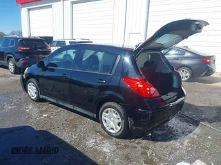 2010 Nissan Versa 1.8 SL with VIN 3N1BC1CP5AL372794, listed as a IAAI auction lot 41603272 with 146,202 mi miles. Bid and sale history available at carsss.com. Image 3.