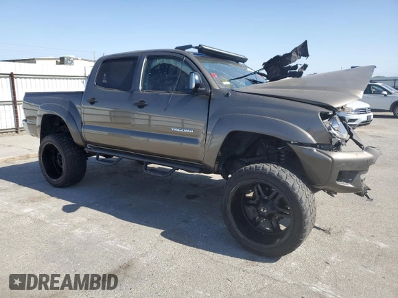 2015 Toyota Tacoma PreRunner with VIN 3TMJU4GN9FM187570, listed as a Copart auction lot 54339785 with Not provided miles and Salvage title. Bid and sale history available at DreamBid. Image 4.