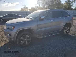 2014 Jeep Grand Cherokee Overland with VIN 1C4RJFCG0EC226397, listed as a Copart auction lot 80295784 with 131,921 mi miles and Salvage Title. Bid and sale history available at DreamBid. Image 1.
