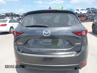 2017 Mazda CX-5 Grand Touring with VIN JM3KFADL3H0227655, listed as a IAAI auction lot 41897981 with 103,545 mi miles. Bid and sale history available at carsss.com. Image 16.