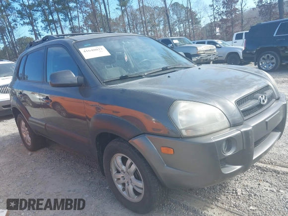 2007 Hyundai Tucson SE with VIN KM8JN12DX7U635740, listed as a IAAI auction lot 41648027 with 169,967 mi miles. Bid and sale history available at carsss.com. Image 1.