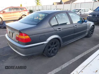 2003 BMW 3 Series 325i with VIN WBAET37473NH03965, listed as a IAAI auction lot 41756045 with 120,482 mi miles and . Bid and sale history available at DreamBid. Image 4.