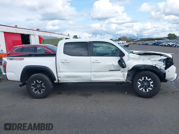 2023 Toyota Tacoma SR z VIN 3TMCZ5AN0PM541700, wystawiony jako IAAI lot #41819408 z przebiegiem 14 216 mil mil oraz . Historia ofert i sprzedaży dostępna na DreamBid. Obrazek 14.