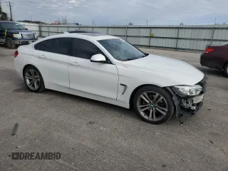 2016 BMW 4 Series 428i with VIN WBA4A9C57GGL87882, listed as a Copart auction lot 84609184 with 139,959 mi miles and Salvage title. Bid and sale history available at DreamBid. Image 4.