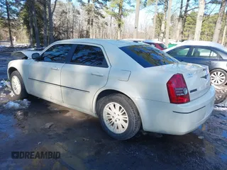 2009 Chrysler 300 Touring with VIN 2C3KA53V99H621745, listed as a IAAI auction lot 41604655 with 115,004 mi miles. Bid and sale history available at carsss.com. Image 3.