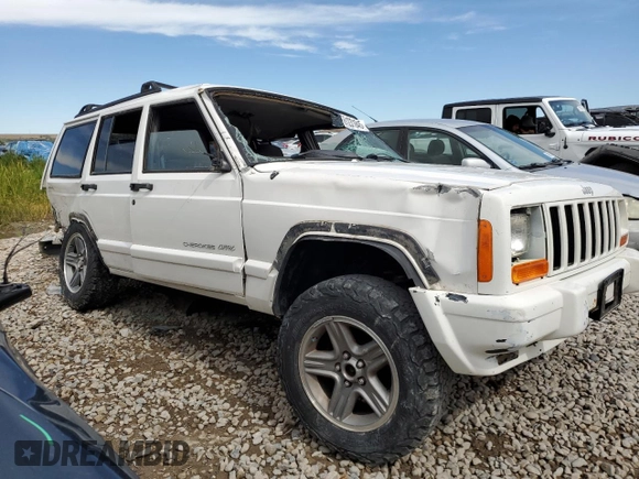 2000 Jeep Cherokee Classic с VIN 1J4FF58S7YL133399, выставлен на аукционе Copart как лот 61231845 с пробегом 196 499 миль миль и Списание • Salvage title. История ставок и продаж доступна на DreamBid. Изображение 4.