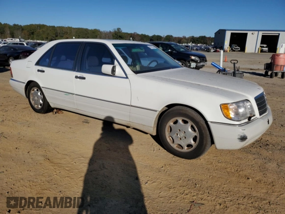 1995 Mercedes-Benz S with VIN WDBGA51E1SA225395, listed as a Copart auction lot 81313224 with 128,402 mi miles and Clean Title. Bid and sale history available at DreamBid. Image 4.