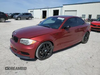 2012 BMW 1 Series 135i with VIN WBAUC9C5XCVM12726, listed as a Copart auction lot 48102254 with 82,285 mi miles and Salvage title. Bid and sale history available at DreamBid. Image 1.