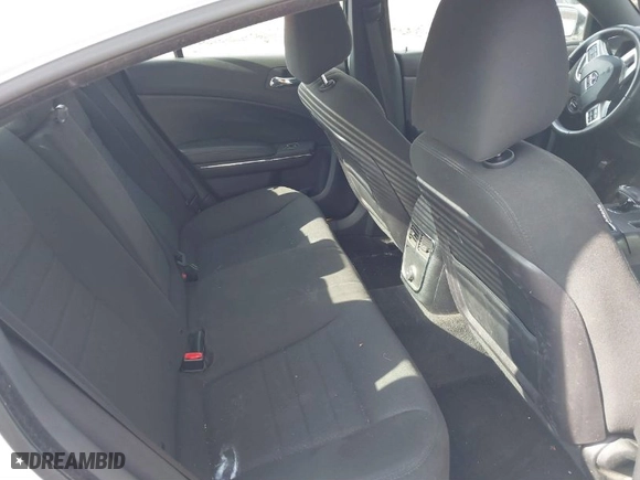 2012 Dodge Charger SE with VIN 2C3CDXBG8CH261739, listed as a IAAI auction lot 41527304 with 104,656 mi miles. Bid and sale history available at carsss.com. Image 8.