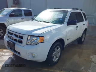 2011 Ford Escape Hybrid with VIN 1FMCU4K3XBKA75758, listed as a IAAI auction lot 42753145 with 170,554 mi miles and . Bid and sale history available at DreamBid. Image 2.