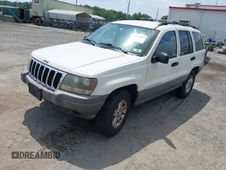 2003 Jeep Grand Cherokee Laredo with VIN 1J4GW48S73C605561, listed as a IAAI auction lot 42424407 with Not provided miles and . Bid and sale history available at DreamBid. Image 2.