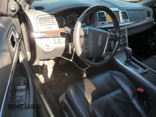 2011 Lincoln MKS with VIN 1LNHL9DR7BG615397, listed as a Copart auction lot 52047015 with 111,720 mi miles and Salvage Title. Bid and sale history available at DreamBid. Image 8.