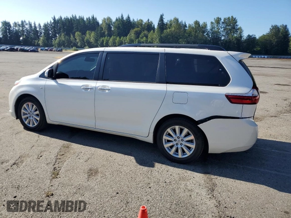 2017 Toyota Sienna XLE with VIN 5TDDZ3DC0HS164600, listed as a Copart auction lot 64262685 with 82,353 mi miles and Salvage title. Bid and sale history available at DreamBid. Image 2.