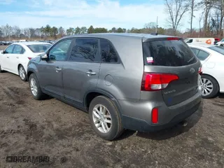2014 Kia Sorento LX with VIN 5XYKT3A60EG533956, listed as a IAAI auction lot 41582215 with 130,026 mi miles. Bid and sale history available at carsss.com. Image 3.