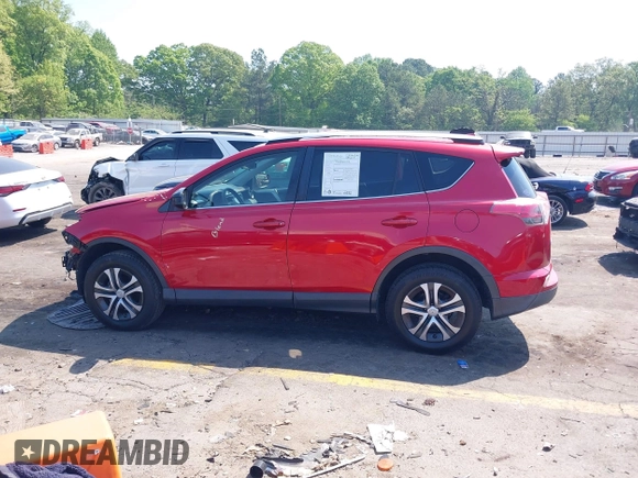 2016 Toyota RAV4 LE with VIN JTMZFREV1GJ098247, listed as a IAAI auction lot 42065800 with 199,172 mi miles and . Bid and sale history available at DreamBid. Image 14.
