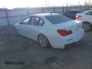 2013 BMW 7 Series 740i with VIN WBAYA6C54DD143796, listed as a IAAI auction lot 41433835 with 1 mi miles. Bid and sale history available at carsss.com. Image 3.