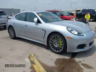2014 Porsche Panamera S E-Hybrid with VIN WP0AD2A78EL044673, listed as a IAAI auction lot 42288484 with 108,880 mi miles and . Bid and sale history available at DreamBid. Image 1.