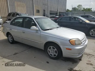 2004 Hyundai Accent GL with VIN KMHCG45C64U524377, listed as a Copart auction lot 53976094 with 65,230 mi miles and Non Repairable. Bid and sale history available at carsss.com. Image 4.